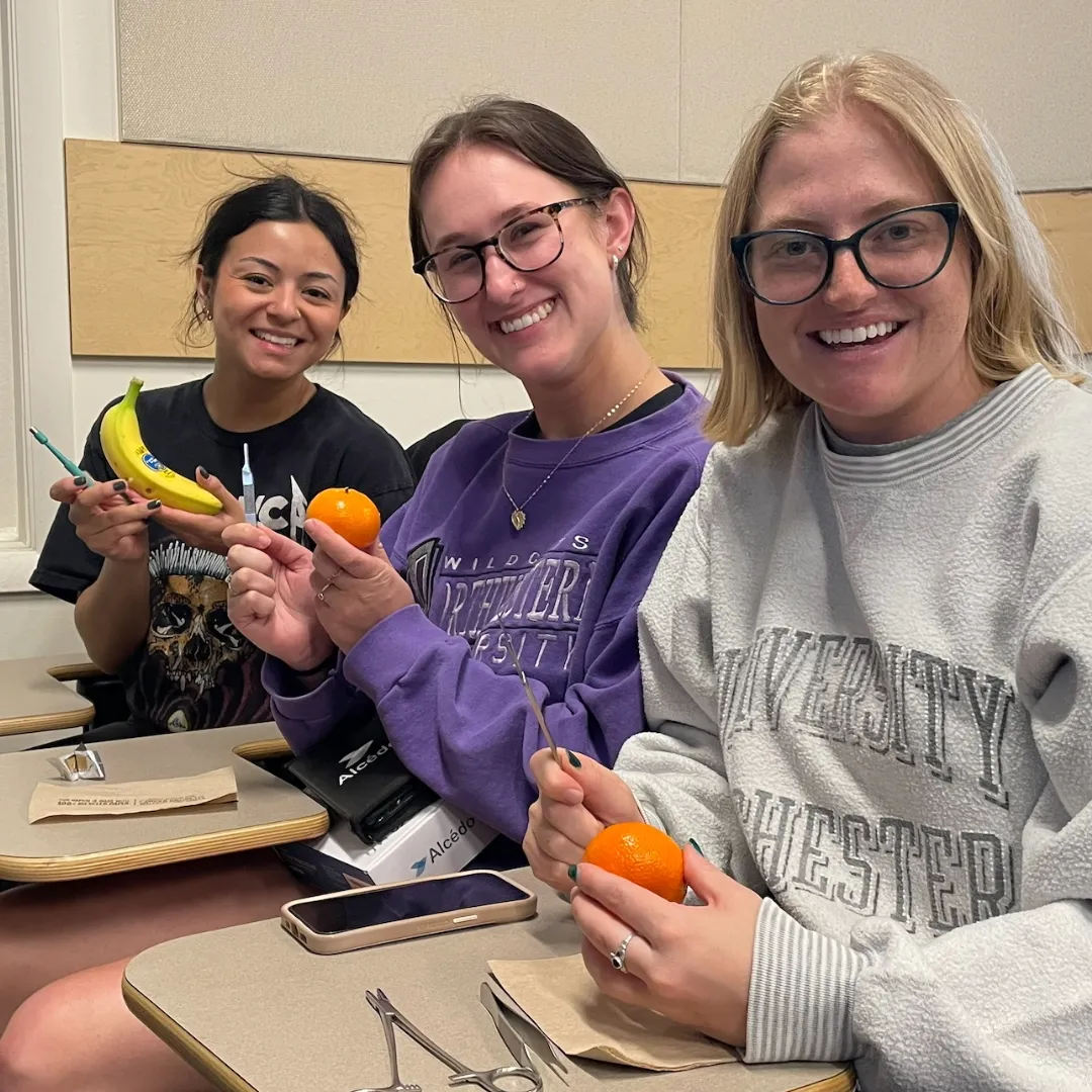 CSU students smile during a punch biopsy lab