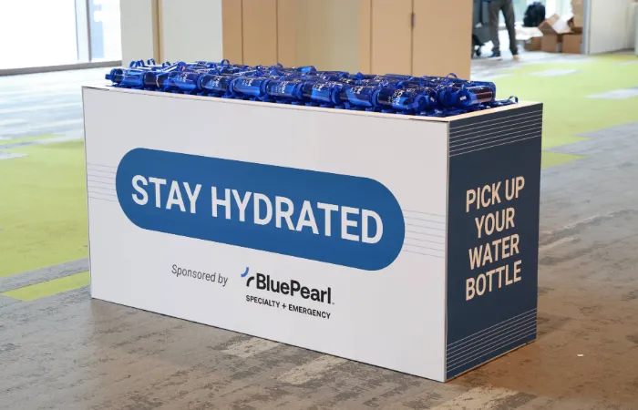 Container of branded water bottles