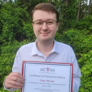 Person holding a certificate