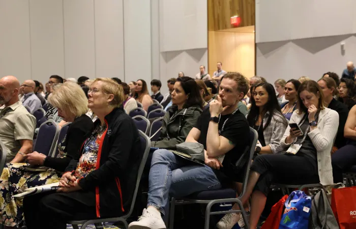 Audience staring offscreen