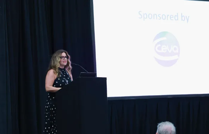 Speaker at podium in Wellbeing Zone