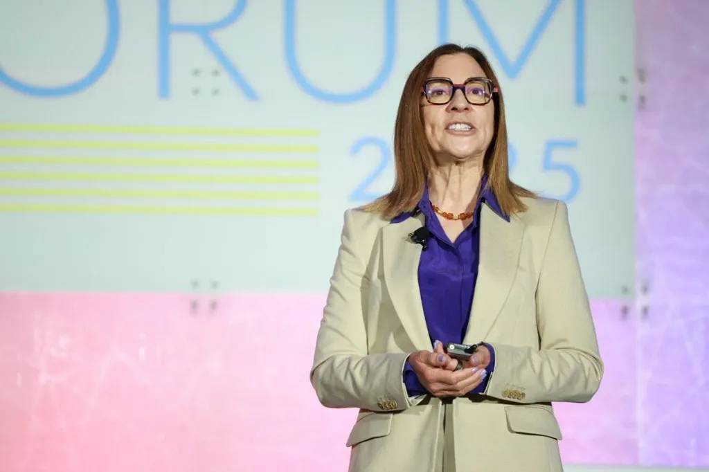 Woman speaking on stage