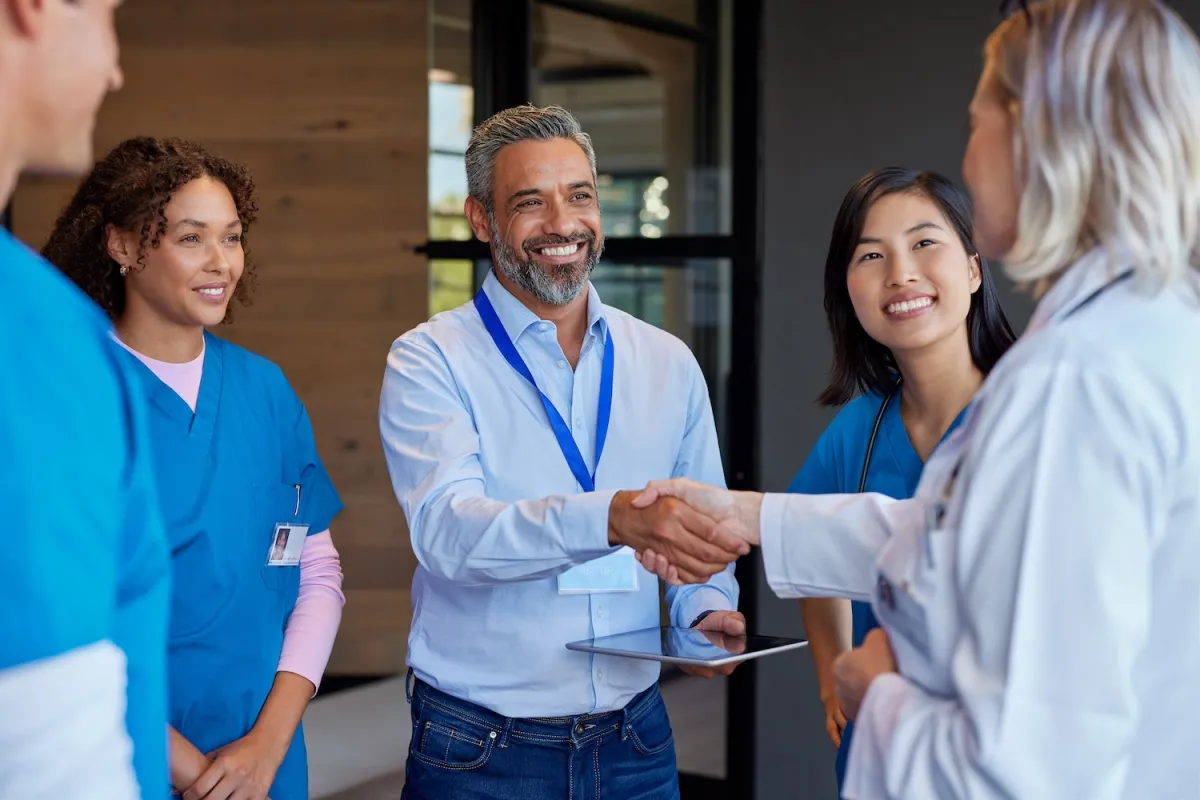 Man shaking hands with veterinarian