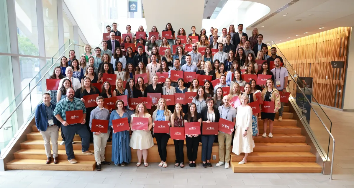 New diplomates holding certificates