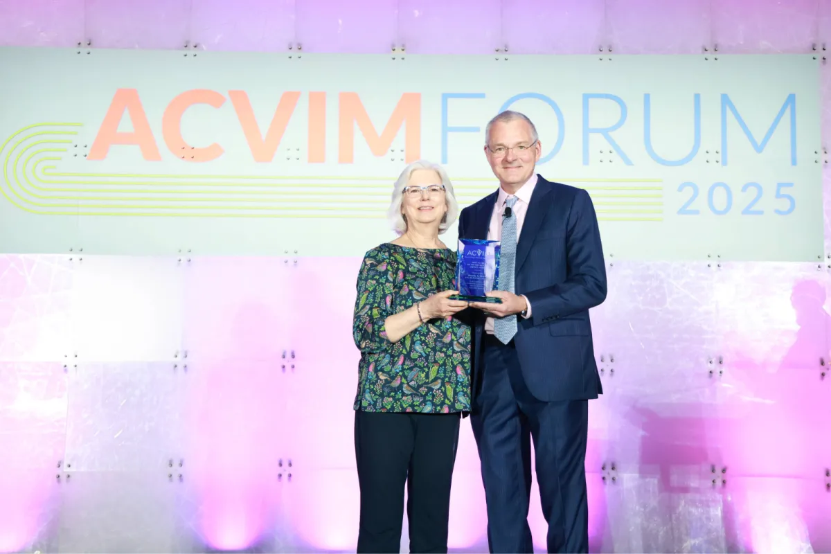 Wendy Ware accepts the 2025 Pyle Award from Dr. Joerg Steiner