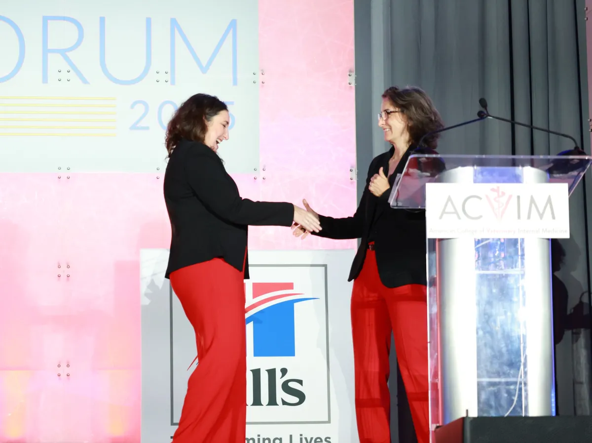 Sponsor shaking hands on stage