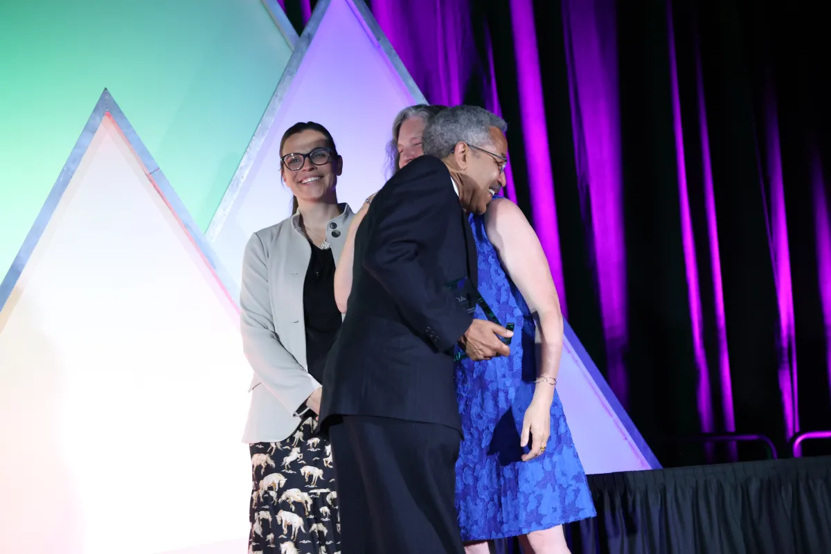 Jody Lulich hugs Sarah Gillings during the 2026 ACVIM Awards Ceremony