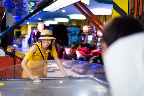 Person playing air hockey