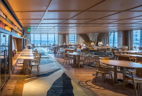 Large dining room overlooking city and water